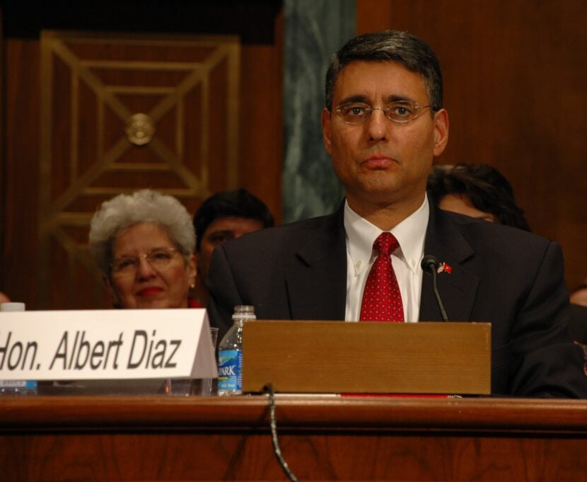 JGeorgia Jacquez Lewis, left, looks on during confirmation hearing.