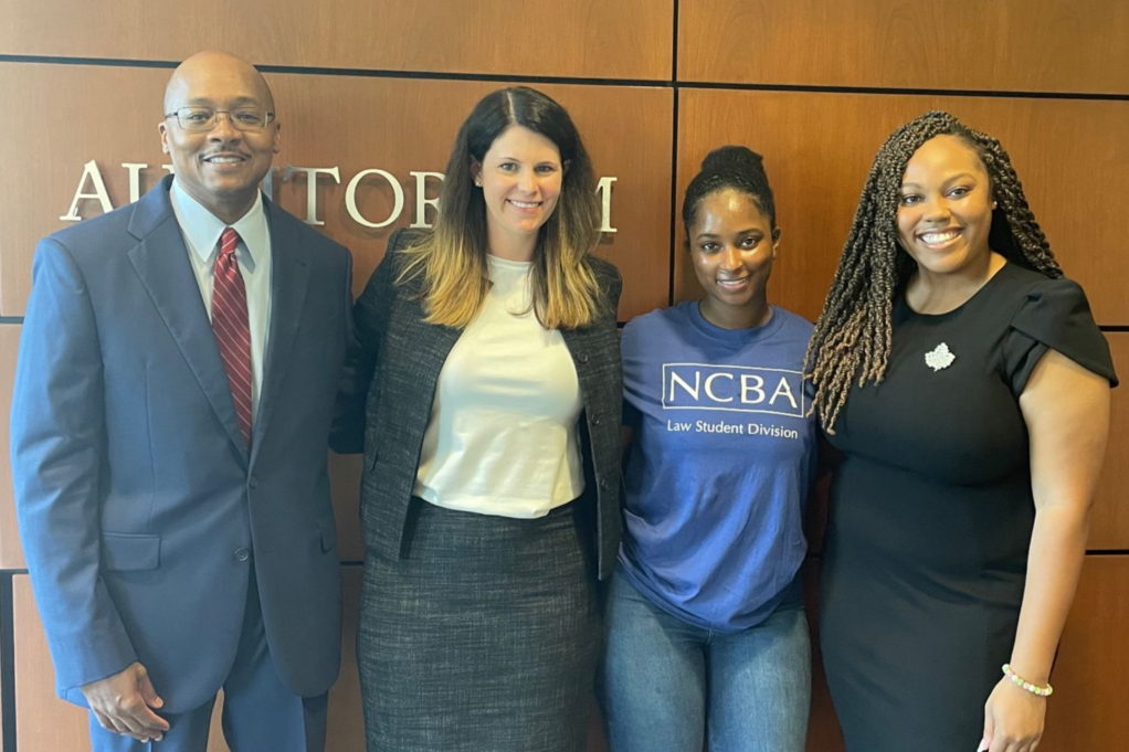 Clayton Morgan, Lisa Williford, NCCU Law Student Rep Tamia Glover, and Sheila Spence stand together. 