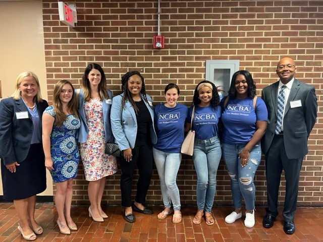 Lisa Williford is pictured standing with Patti Ramseur, Clayton Morgan, Kayla Britt, Sheila Spence, and three NCBA representatives.